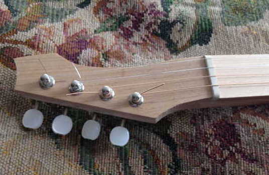 headstock with straight string pulls